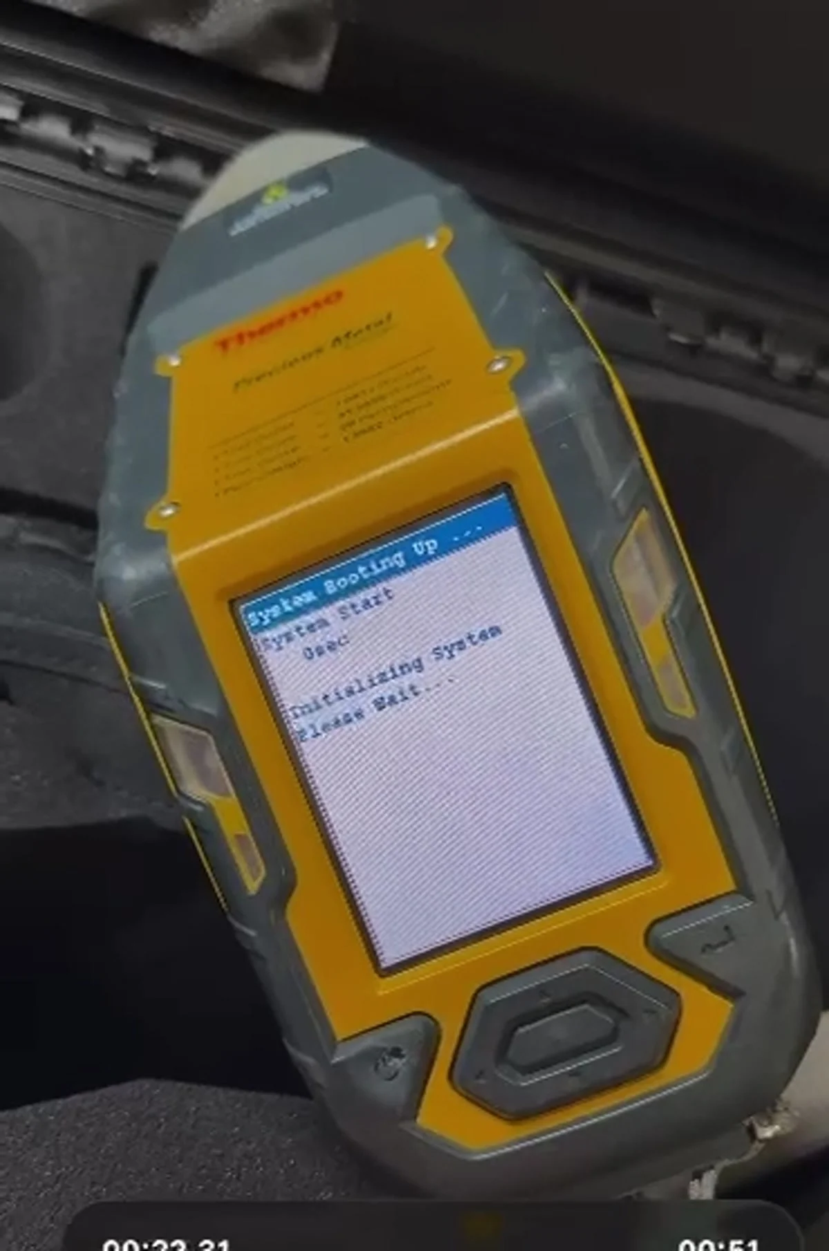 Thermo Scientific Niton XL2 Precious Metal handheld XRF spectrometer powered on, the most common unit we repair at ForceData